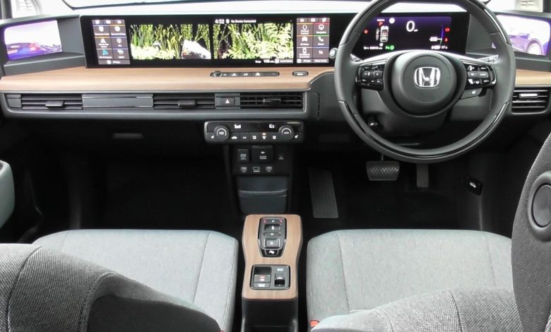 electric car dashboard with large touchscreen