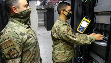 technician installing fibre optic cables