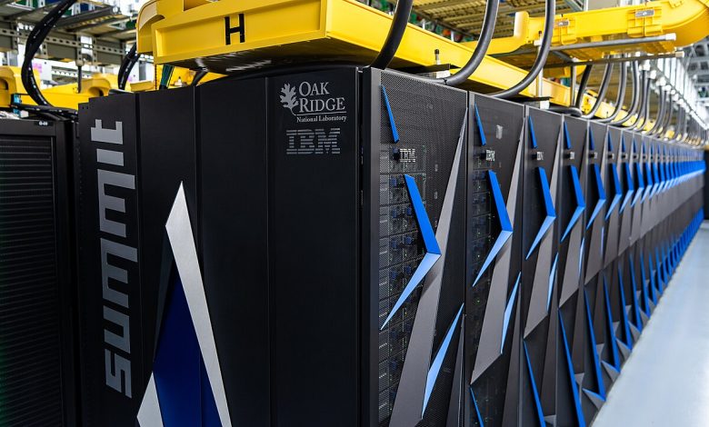 Rows of supercomputer cabinets in a data centre hall