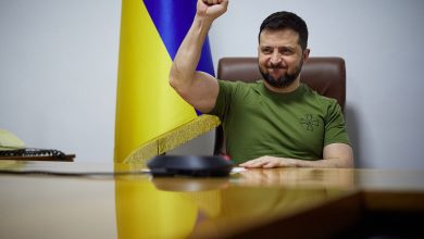 Workers rebuilding homes and a school in Ukraine