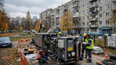 Backup generators installed beside a residential district in Kyiv ahead of winter