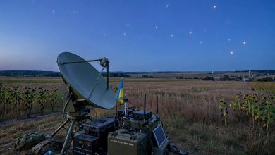 Satellite communications terminal in Ukraine with satellites visible in the evening sky